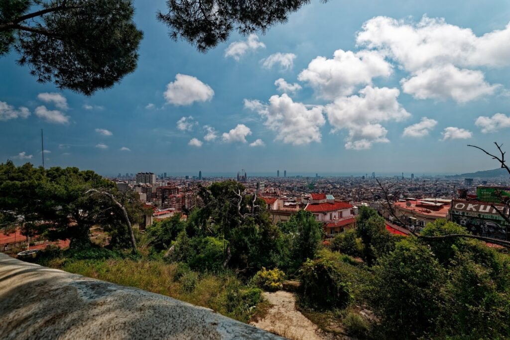Wide panorama of Barcelona from Park Güell with Sagrada Família in the cityscape