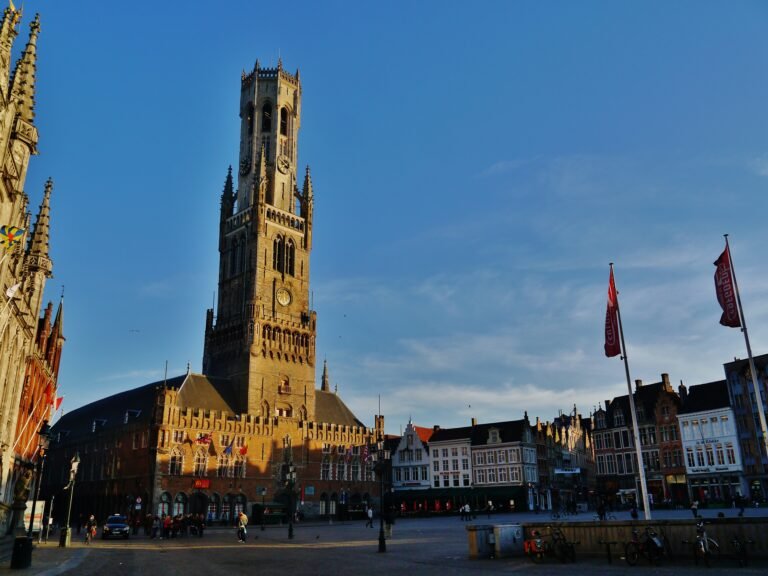 Belfry of Bruges rising above Markt square