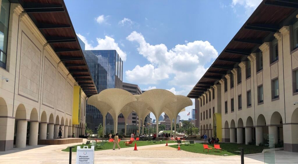 Blanton Museum of Art plaza in Austin with large shaded petal structures