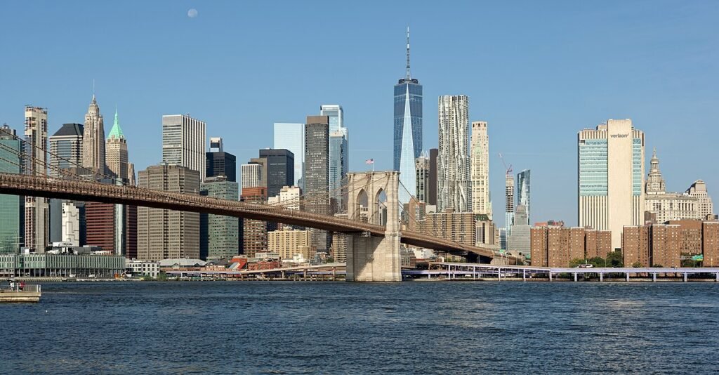 Brooklyn Bridge spanning the East River with the Lower Manhattan skyline behind it
