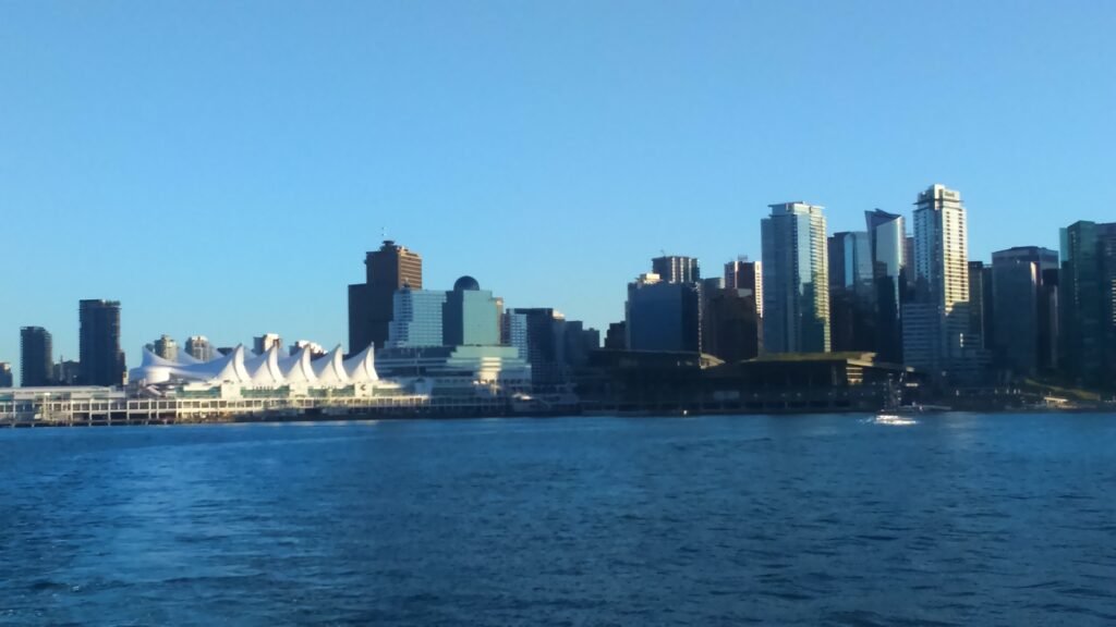 Canada Place and downtown Vancouver beside Burrard Inlet
