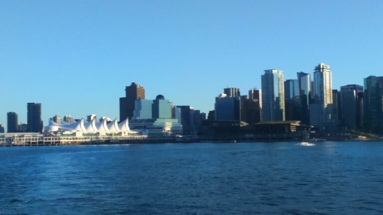 Canada Place and downtown Vancouver beside Burrard Inlet
