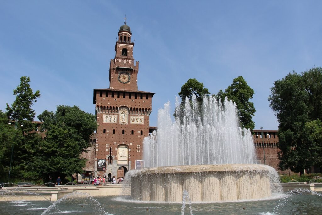 Castello Sforzesco and the fountain in Piazza Castello, Milan