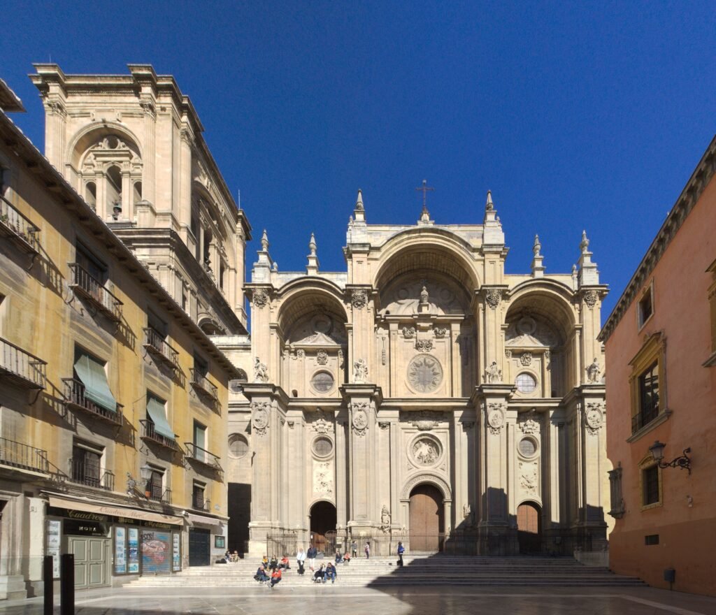 Front façade of Granada Cathedral opening onto Plaza de las Pasiegas