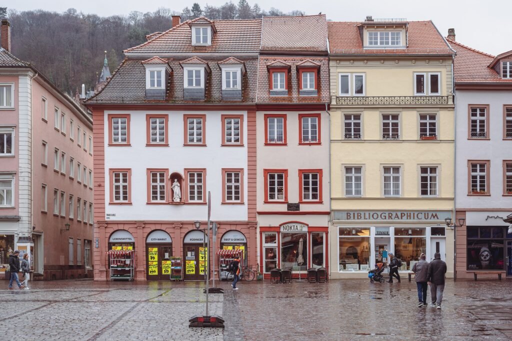 Pedestrian Hauptstraße lined with historic buildings near Marktplatz in Heidelberg