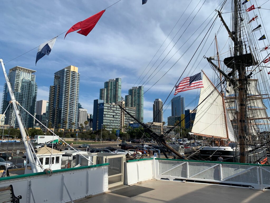 Historic ship masts in front of the San Diego downtown skyline on the Embarcadero