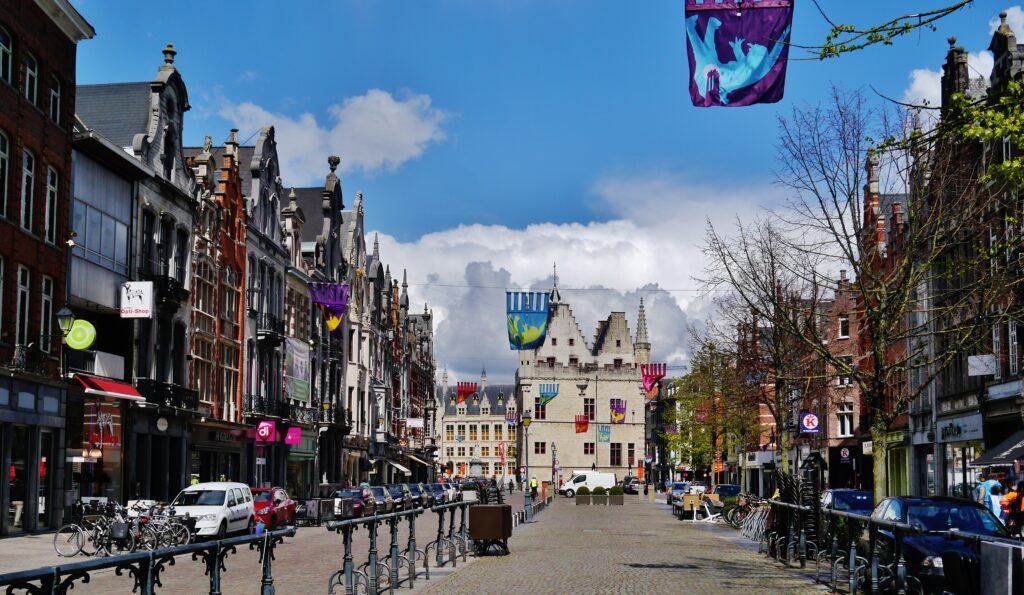 Historic facades and street space along IJzerenleen in Mechelen