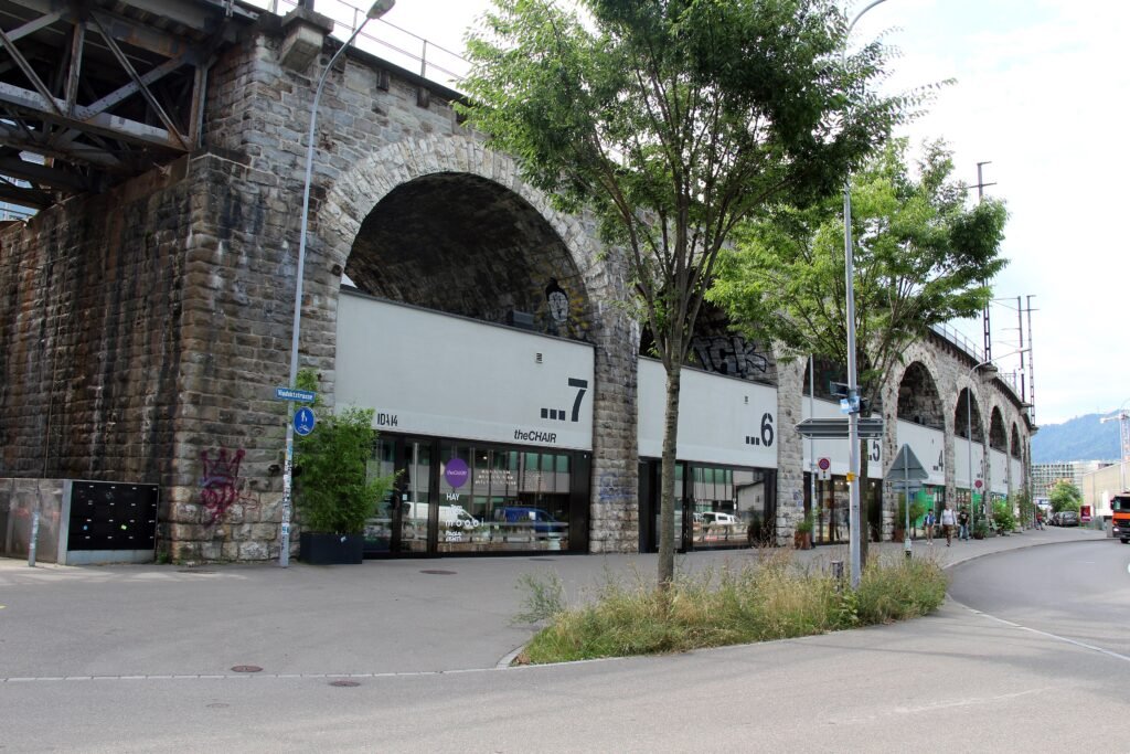 Shops and pedestrian space beneath the Im Viadukt railway arches in Zurich West