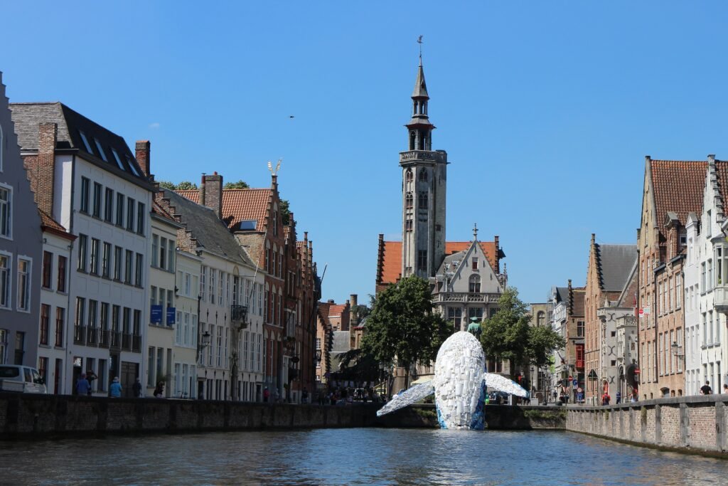 Jan van Eyckplein square and historic buildings in Bruges
