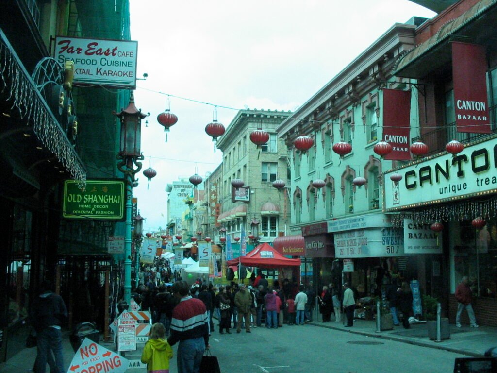 Red lanterns hanging above a street in San Francisco Chinatown