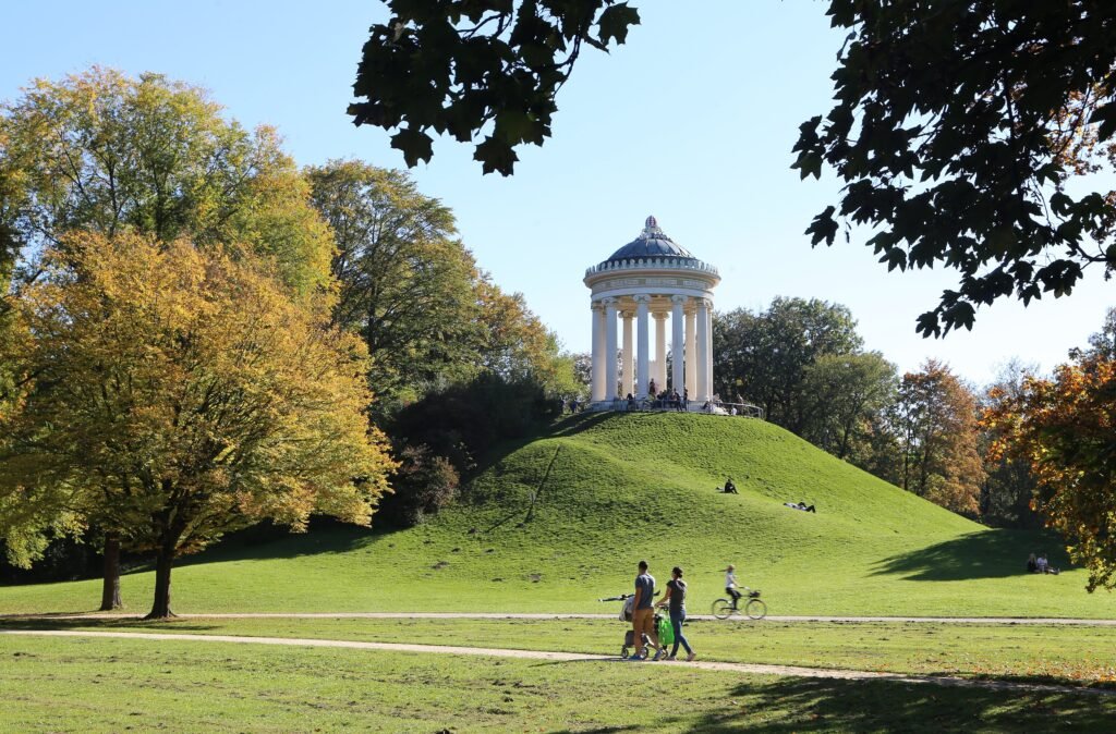 Monopteros hill and lawns in the English Garden in Munich