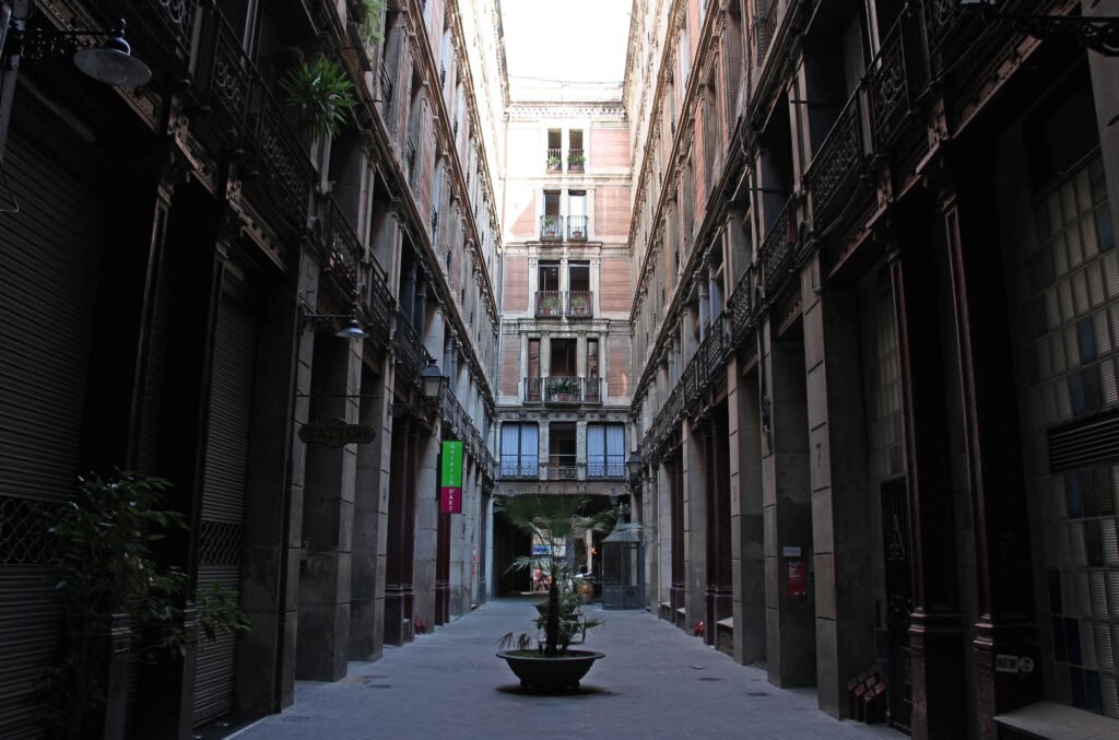 Narrow stone passage in Barcelona's Gothic Quarter