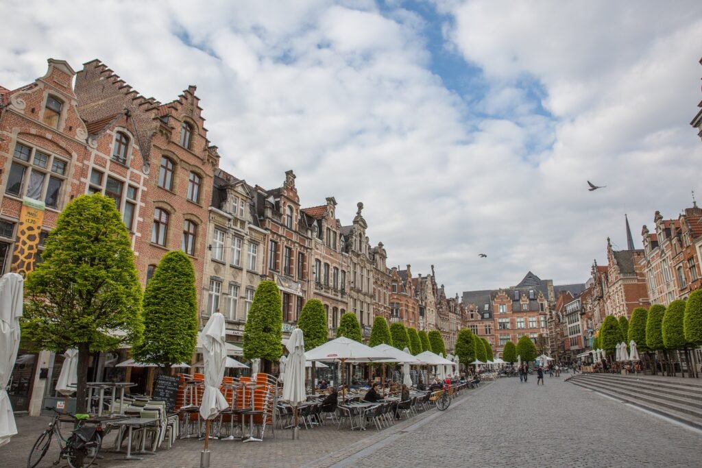 Oude Markt in Leuven with cobblestones, café terraces and historic façades