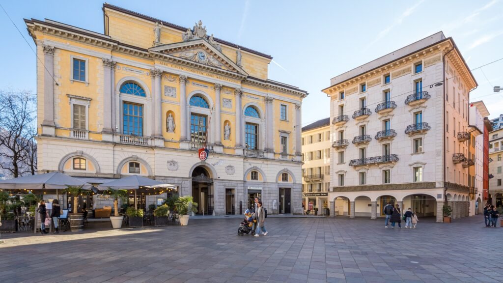 Piazza della Riforma in Lugano with Palazzo Civico and the entrance to Via Nassa