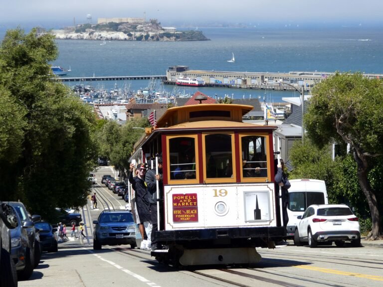 San Francisco cable car climbing Hyde Street with the bay in the distance