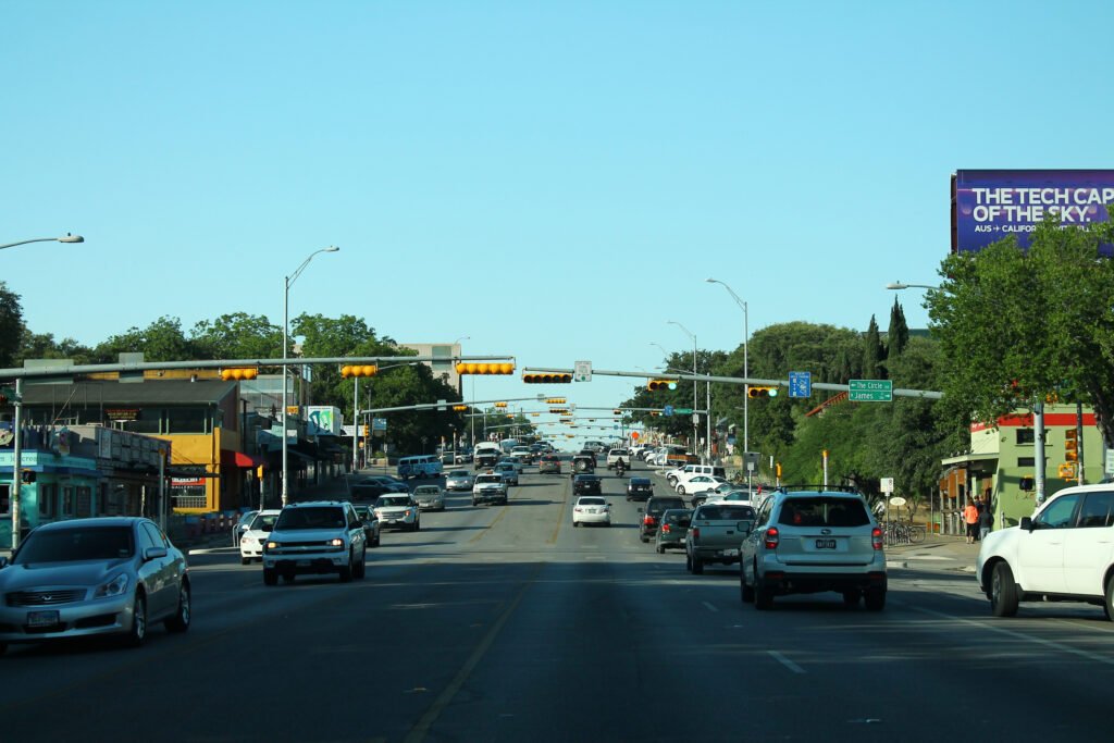 South Congress Avenue in Austin with shops, traffic and sidewalks