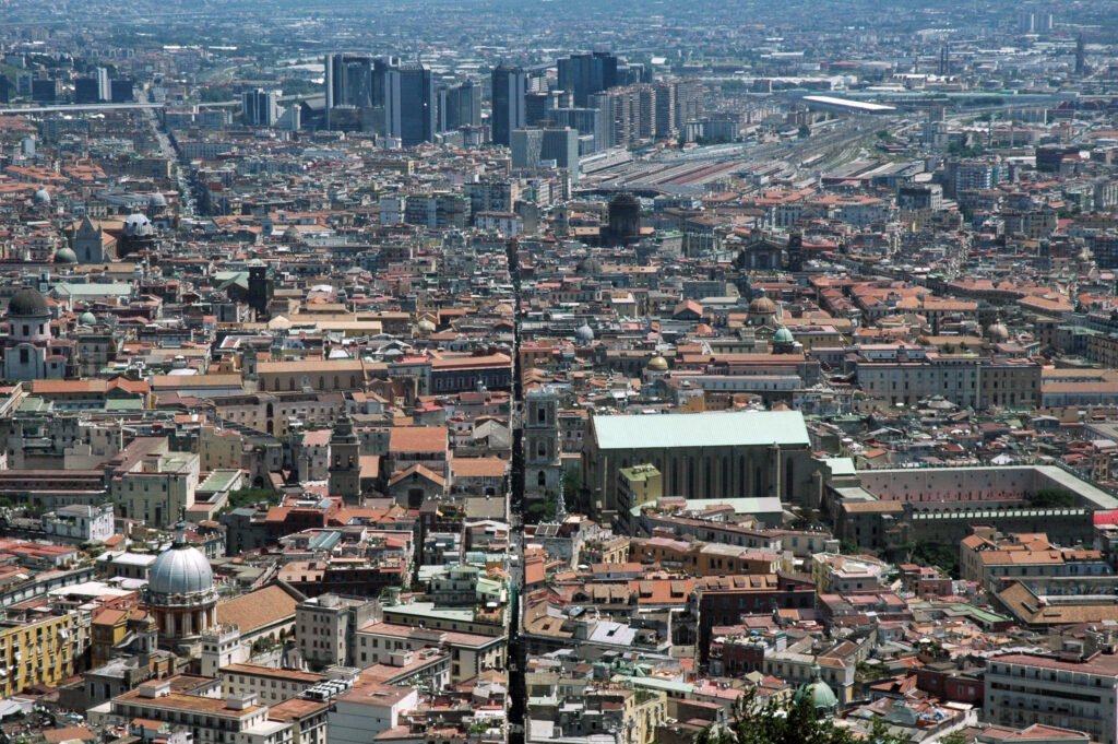 Spaccanapoli cutting through the dense historic center of Naples, viewed from Castel Sant'Elmo