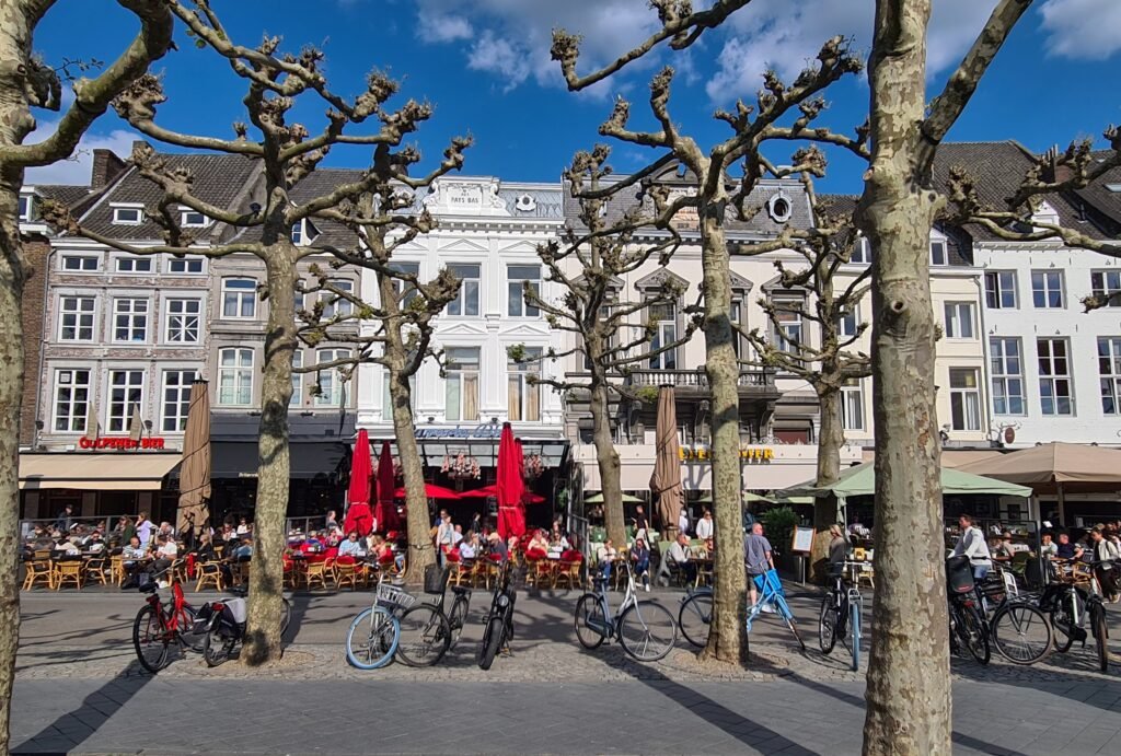 Vrijthof square in Maastricht with historic churches and open public space