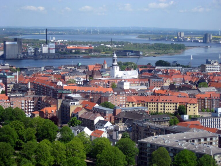 Aalborg city center with Budolfi Church and the Limfjord behind it