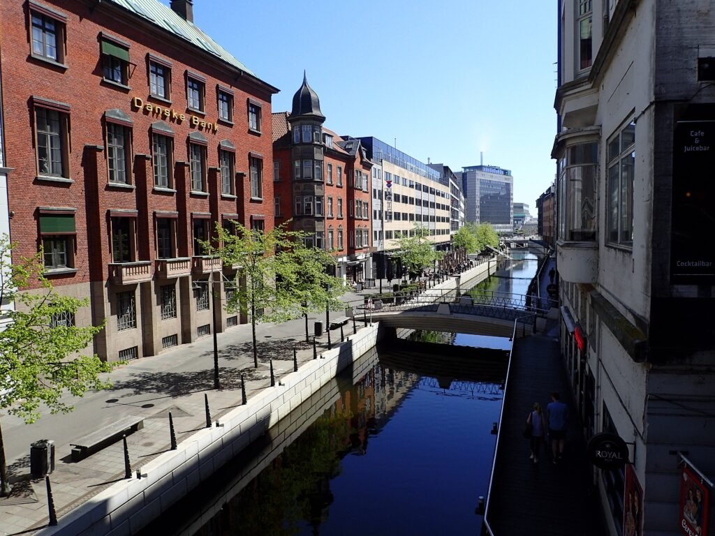 Aarhus Å at Åboulevarden with a bridge and pedestrians