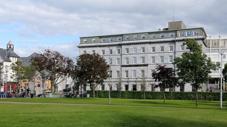 Eyre Square lawn and surrounding buildings in central Galway