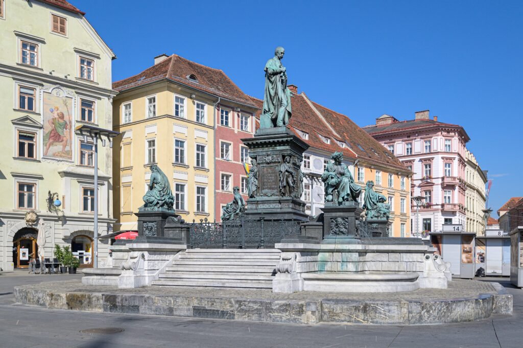 Hauptplatz in Graz with Erzherzog Johann fountain and historic facades