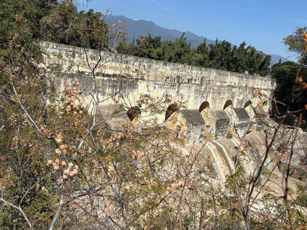 Historic stone aqueduct arches in Oaxaca City’s Xochimilco neighborhood