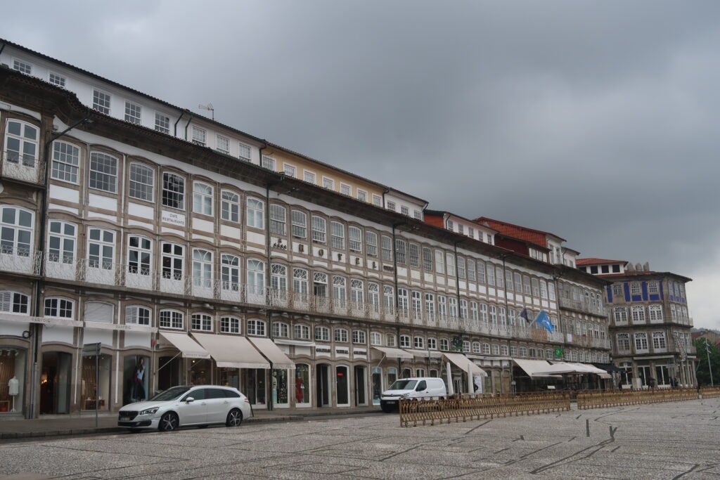 Largo do Toural in Guimarães with historic façades, paving and the central square