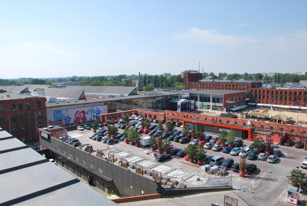 Manufaktura complex in Łódź with brick factory buildings and its large central space