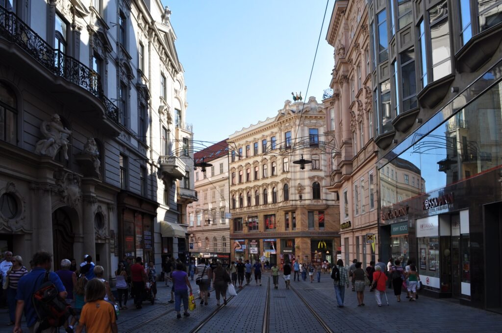Masarykova street in Brno with tram tracks and pedestrians