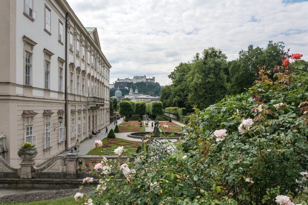Mirabell Palace gardens in Salzburg with Hohensalzburg Fortress beyond