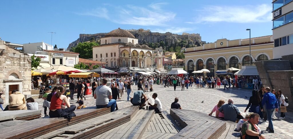 Pedestrians crossing Monastiraki Square in central Athens