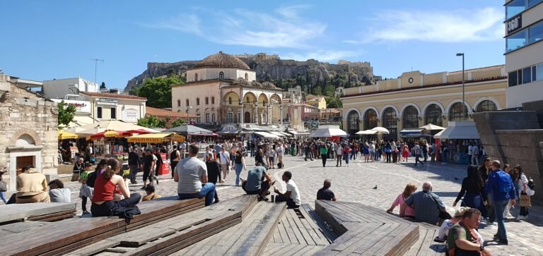 Pedestrians crossing Monastiraki Square in central Athens