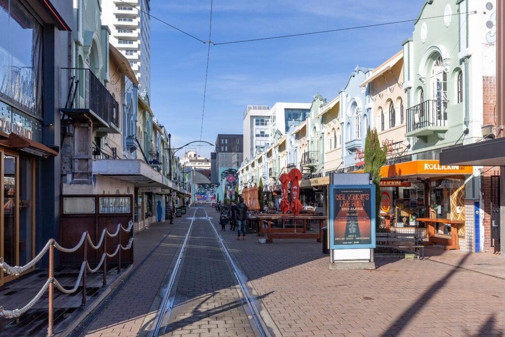 Pedestrians and heritage shopfronts along New Regent Street in central Christchurch