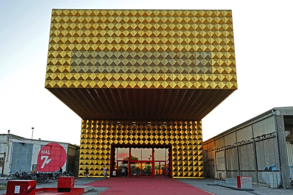 Gold-clad RAGNAROCK Museum building in Roskilde's Musicon district