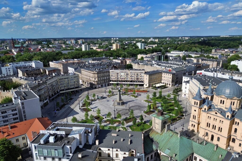 Rebuilt Plac Wolności in Łódź with pedestrian areas, tram tracks and surrounding streets