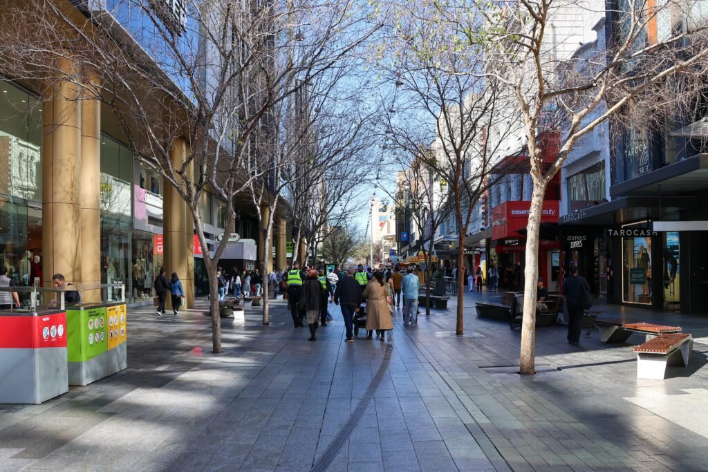 Pedestrians walking through Rundle Mall in central Adelaide