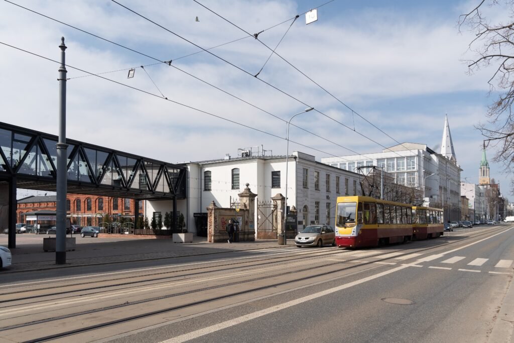 Tram tracks, a tram and roadway on southern Piotrkowska Street in Łódź