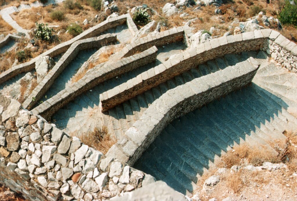 Steep zigzagging stone steps on the ascent to Palamidi Fortress in Nafplio