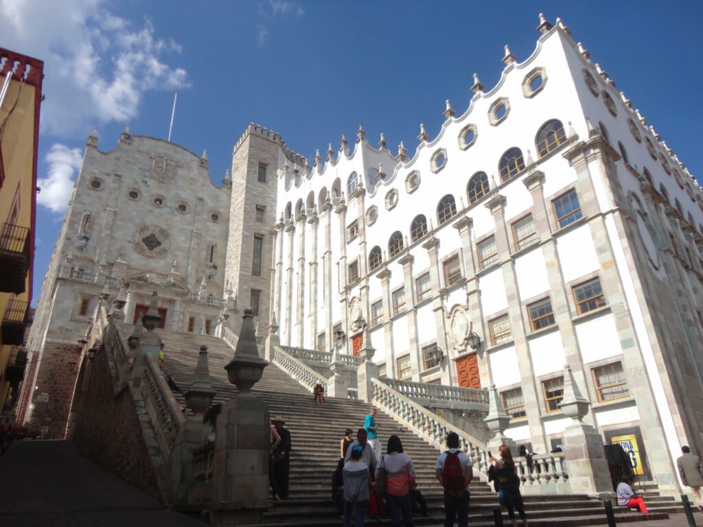 Broad staircase rising to the central building of the University of Guanajuato
