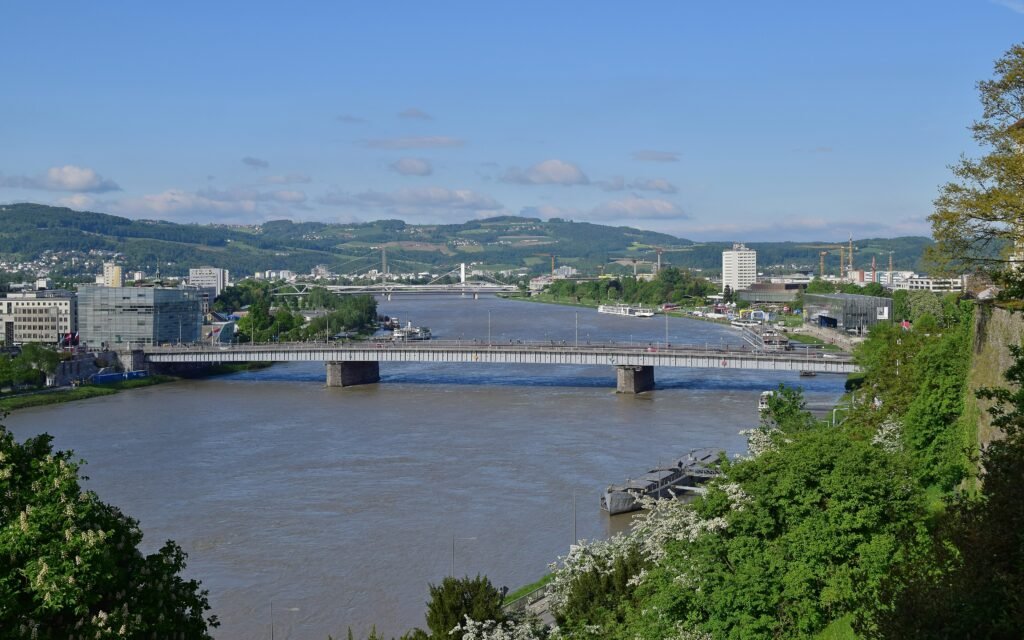 Linz Danube waterfront from Schlossberg with Nibelungenbrücke, Ars Electronica and Lentos